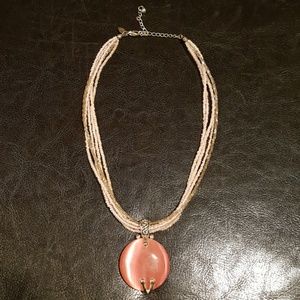 Pink stone with beaded necklace